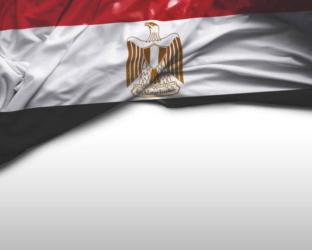 Grunge map of Egypt with its flag printed within its border on an old paper.