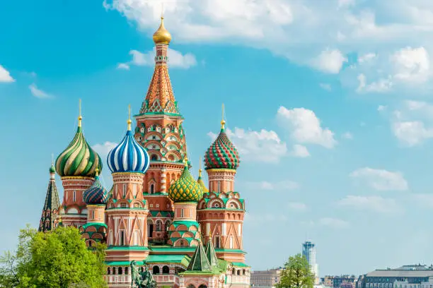 Famous Saint Basil Church in summer under blue cloudless sky with plenty of copy space for your layout. Russian Orthodox Cathedral, the most famous international landmark on the Red Square in Moscow, Russia.