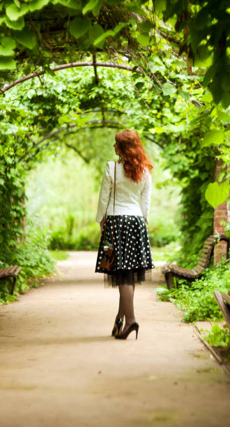 istock Woman with an vintage camera 806301386