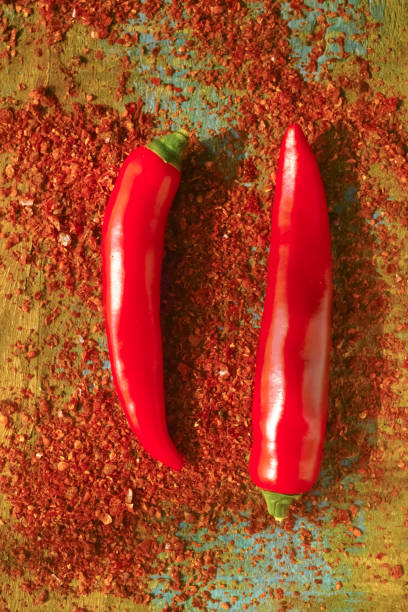 istock Red hot chili Cayenne pepper fresh and dried powdered spice, rea 806309914