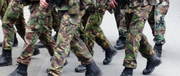istock Soldiers Marching On The Street 806328688