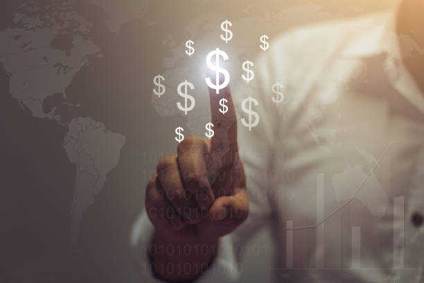 istock Businessman presenting financial analysis with charts generated by big data displaying international success and dollar signs 806349128