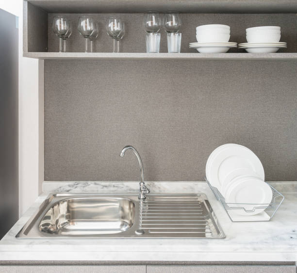 istock modern kitchen room with sink on granite counter top 806355204