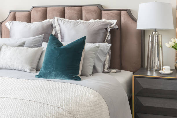 istock classic bedroom style with set of pillows and lamp on table side 806355230