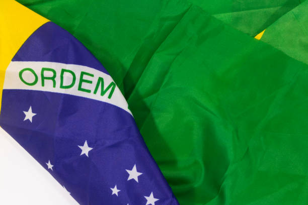 istock Brazilian waving flag isolated on white background. Concept Image. 806357372