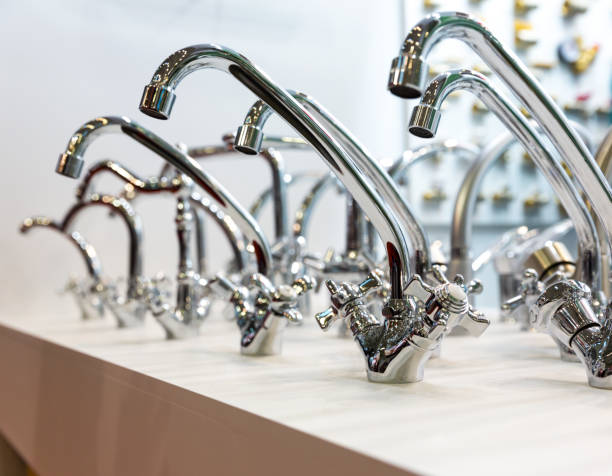 istock Kitchen faucets on shelf closeup, plumbing shop 806362832