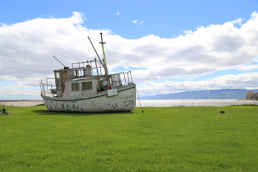 Old boat on the grass at L'Isle-aux-Coudres