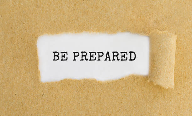istock Text Be Prepared appearing behind ripped brown paper. 806363260