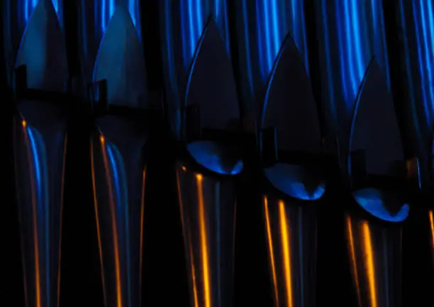 Pipes of an organ, abstract background.