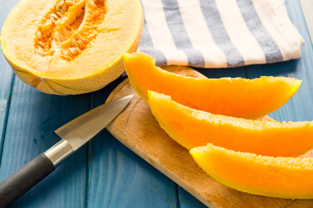 istock cantaloupe melon on the wooden table 806377866