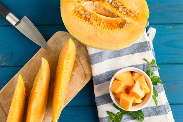 istock cantaloupe melon on the wooden table 806377868