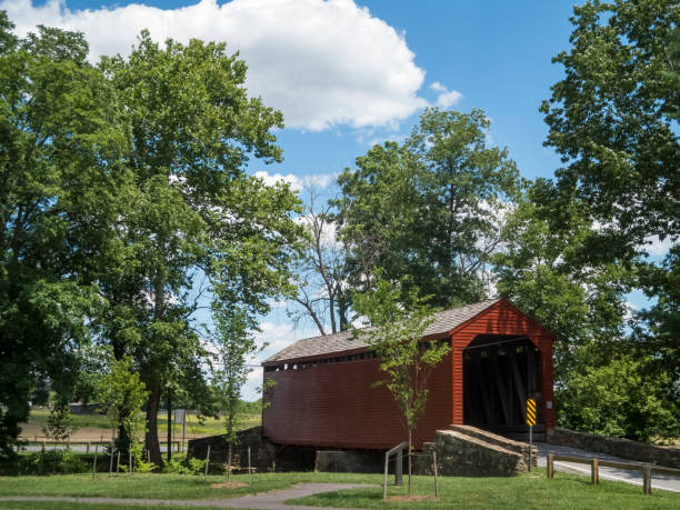 istock Side View of Roddy Road Covered Bridge In Springtime 806377882