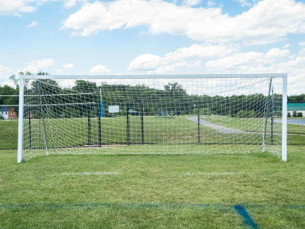 soccer goalpost and fluffy white clouds - yard line fluffy soccer field soccer imagens e fotografias de stock