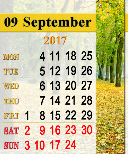 istock calendar for September 2017 with path in Autumn park 806393954