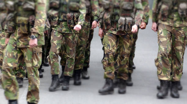 istock So Many Military Marching On The Street 806394280