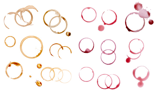 collection of various coffee and wine stains on white background. each one is shot separately