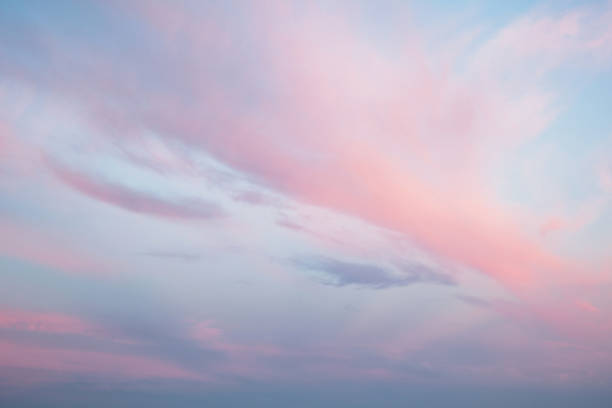 istock Blue sky with white and blue, and pink clouds. Clear sky. Beautiful landscape 806402310