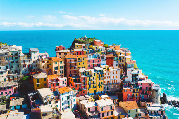 Breathtaking Cinque Terre village, Manarola, Italy Cinque terre in Italy, road trip, springtime travel destination, tourists having fun, exploring the city, visiting famous places and sightseeing unesco world heritage site stock pictures, royalty-free photos & images