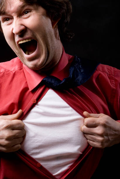 istock Furious businessman rips his shirt 806415252