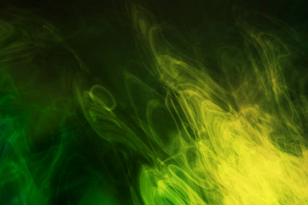 istock Green and yellow smoke 806428490
