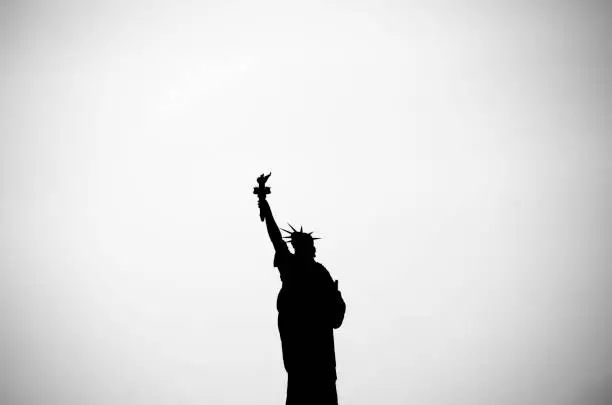 Photo of The Statue of Liberty is a colossal neoclassical sculpture on Liberty Island in New York Harbor in New York City, in the United States.