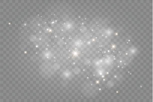 ilustraciones, imágenes clip art, dibujos animados e iconos de stock de polvo en un background.bright transparente de estrellas. el efecto de iluminación resplandor - efecto de luz