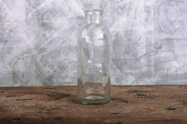 istock Medical bottle on a cement background 806476142