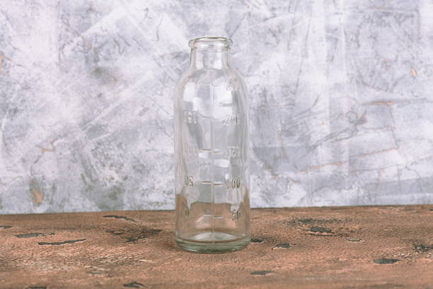 istock Medical bottle on a cement background 806476156