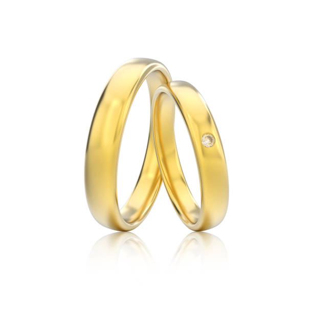 istock 3D illustration two yellow gold classic wedding rings with diamond with reflection 806561930