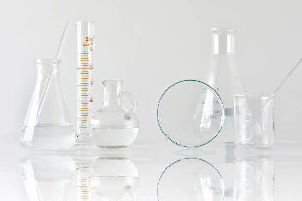 istock Group of scientific laboratory glassware with clear liquid solution, Research and development concept. 806562028