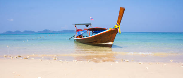 istock Boat On Beautiful Tropical Sand Beach 806598376