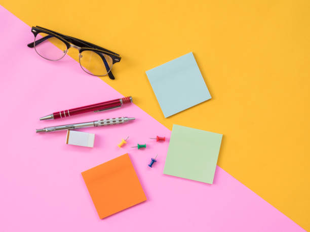 istock Flat Lay Stationary on Pink and yellow background 806614224