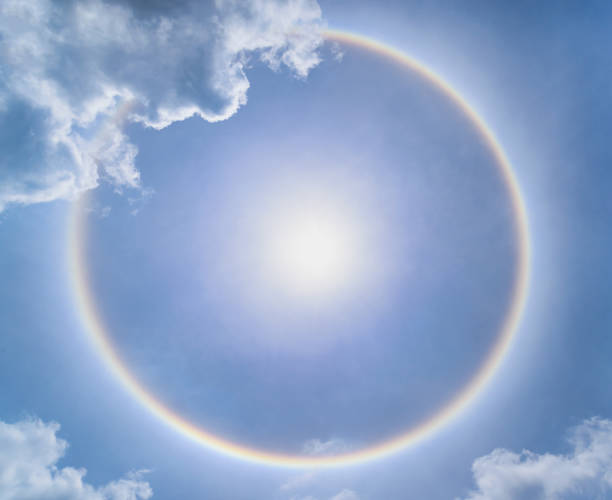 istock Blur sun halo with cloud in the blue sky. 806624088