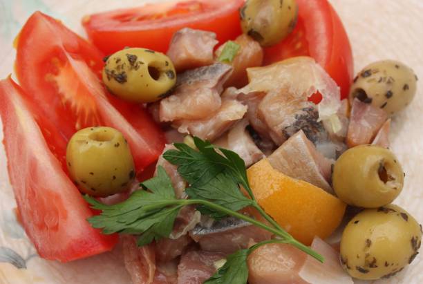istock Hors d'oeuvre - Smoked herring - Olives - tomatoes 806629078