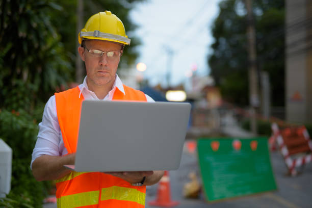 istock Portrait of mature man construction worker at the construction site 806667426