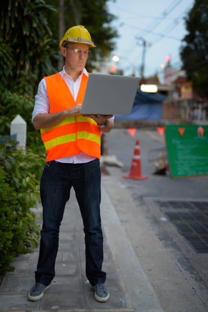istock Portrait of mature man construction worker at the construction site 806667458