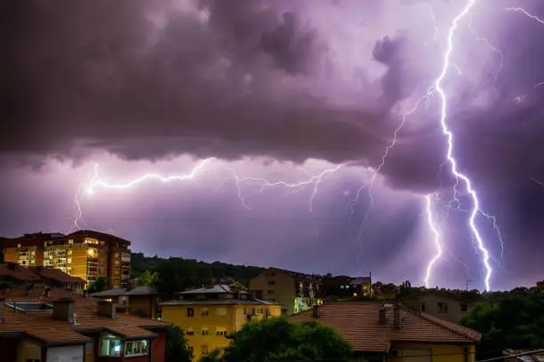 Thunderhead and Lightning Over City.