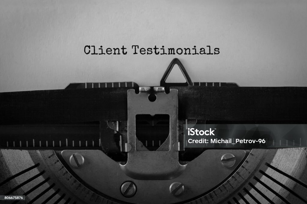 Text Client Testimonials typed on retro typewriter Testimonial Stock Photo