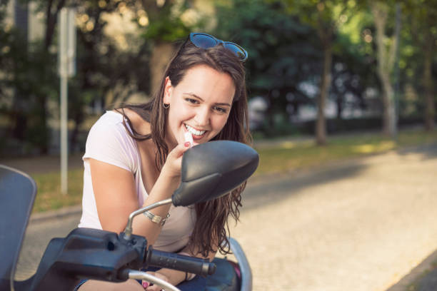 istock Young modern woman on motorcycle 806703696