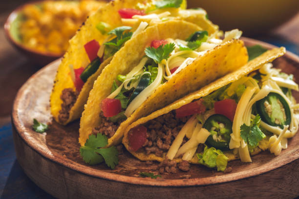istock Mexican Tacos with Spicy Salsa, Minced Meat and Guacamole 806707876