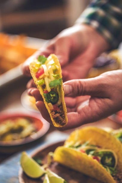 istock Mexican Tacos with Spicy Salsa, Minced Meat and Guacamole 806710066