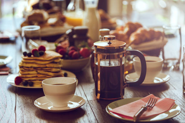 istock Stack of Pancakes with Maple Syrup, Berries and Fresh Coffee 806711460