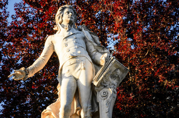 Monument in memory of Wolfang Amadeus Mozart in Vienna Monument in memory of Wolfang Amadeus Mozart in Burggarten, public park of Vienna (Austria), The sculpture was made by Viktor Tilgner in 1896 and is one of the most famous landmark in Vienna wolfgang amadeus mozart photos stock pictures, royalty-free photos & images