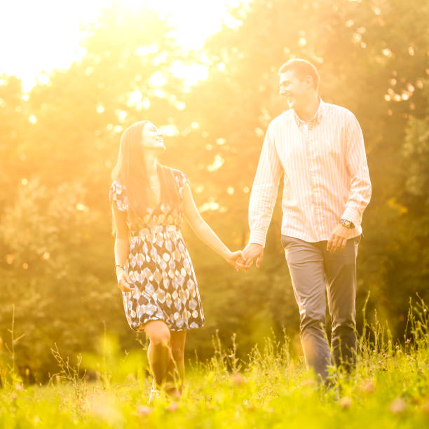 istock Happy couple in park 806729854
