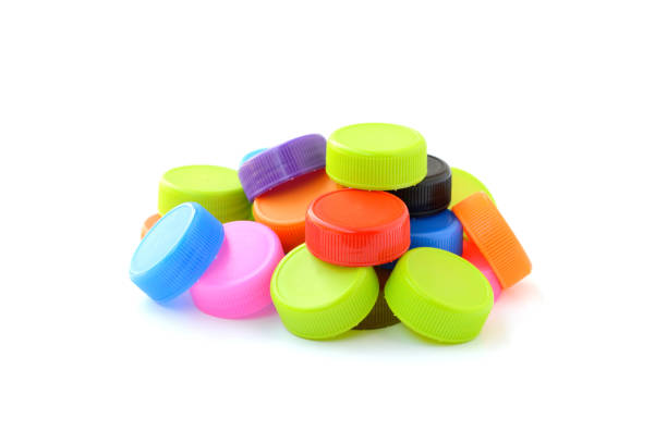 istock pile of colorful plastic bottle cap on white background 806742290