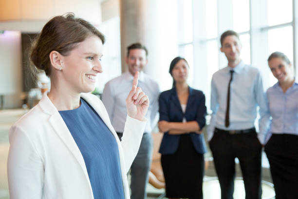 istock Optimistic female business leader having idea 806745758