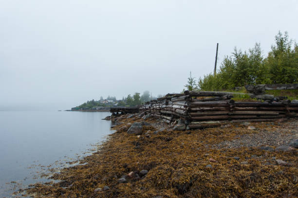 istock White sea, old slip dock, Chupa Karelia, white polar night 806760776