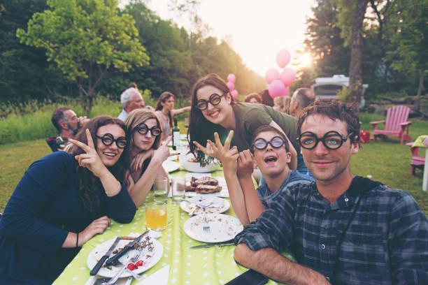 Young people fooling around during birthday party