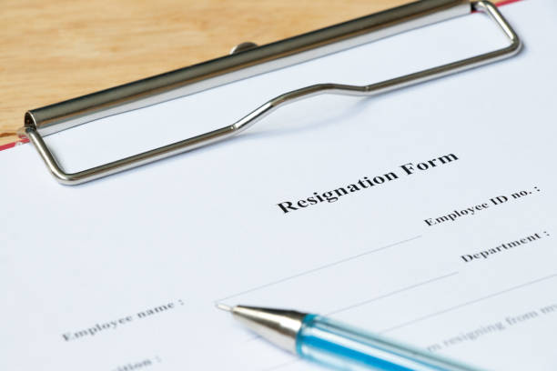 istock Resignation form on wood desk background 806807848