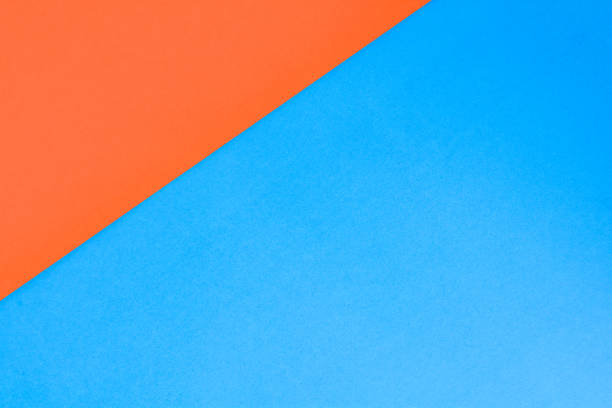 istock colorful blue and orange paper background 806816848